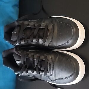 Black leather Nike sneakers